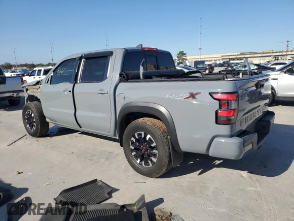 2022 Nissan Frontier Pro-X with VIN 1N6ED1EJ4NN647123, listed as a Copart auction lot 86296104 with 80,822 mi miles and Salvage title. Bid and sale history available at DreamBid. Image 2.
