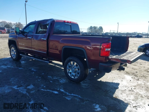 2017 GMC Sierra 2500HD Denali z VIN 1GT12UEY0HF186720, wystawiony jako IAAI lot #41580466 z przebiegiem Nie podano mil oraz . Historia ofert i sprzedaży dostępna na DreamBid. Obrazek 3.