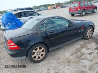 1999 Mercedes-Benz SLK 230/320 with VIN WDBKK47F0XF086064, listed as a IAAI auction lot 42223522 with 166,381 mi miles and . Bid and sale history available at DreamBid. Image 4.