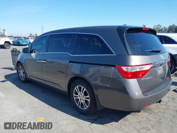 2011 Honda Odyssey EX-L with VIN 5FNRL5H68BB083492, listed as a IAAI auction lot 42087699 with 155,141 mi miles and . Bid and sale history available at carsss.com. Image 14.