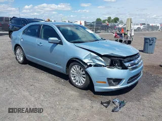 2010 Ford Fusion Hybrid z VIN 3FADP0L33AR385001, wystawiony jako IAAI lot #42074965 z przebiegiem 195 962 mil mil oraz . Historia ofert i sprzedaży dostępna na DreamBid. Obrazek 1.