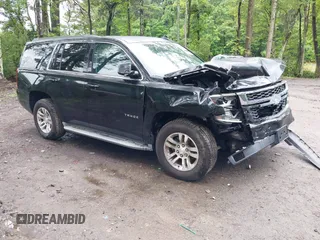 2015 Chevrolet Tahoe LT with VIN 1GNSCBKC9FR600997, listed as a IAAI auction lot 42383789 with 161,151 mi miles and . Bid and sale history available at DreamBid. Image 1.