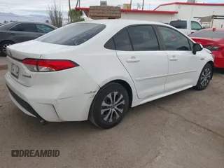 2021 Toyota Corolla Hybrid LE with VIN JTDEAMDE6MJ008815, listed as a IAAI auction lot 41586643 with 7,548 mi miles. Bid and sale history available at carsss.com. Image 4.