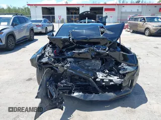 2018 Chevrolet Camaro 1LT z VIN 1G1FB1RX8J0184852, wystawiony jako IAAI lot #42268638 z przebiegiem 99 610 mil mil oraz . Historia ofert i sprzedaży dostępna na DreamBid. Obrazek 13.