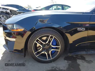 2019 Ford Mustang GT Premium z VIN 1FATP8FF5K5193437, wystawiony jako IAAI lot #42608815 z przebiegiem 67 115 mil mil oraz . Historia ofert i sprzedaży dostępna na DreamBid. Obrazek 6.