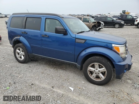 2009 Dodge Nitro SE with VIN 1D8GT28KX9W533248, listed as a Copart auction lot 70500994 with 124,091 mi miles and Salvage Title. Bid and sale history available at DreamBid. Image 4.