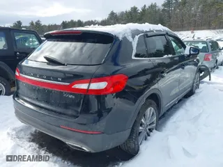 2016 Lincoln MKX Reserve with VIN 2LMTJ8LP1GBL73400, listed as a IAAI auction lot 41534957 with 192,245 mi miles. Bid and sale history available at carsss.com. Image 4.