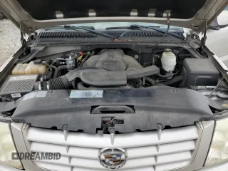 2004 Cadillac Escalade z VIN 1GYEK63N04R309148, wystawiony jako Copart lot #51259085 z przebiegiem 106 646 mil mil oraz Czysty tytuł • Clean title. Historia ofert i sprzedaży dostępna na DreamBid. Obrazek 12.