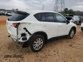 2014 Mazda CX-5 Touring with VIN JM3KE2CY1E0379158, listed as a Copart auction lot 50085935 with 90,340 mi miles and Salvage Title. Bid and sale history available at carsss.com. Image 3.