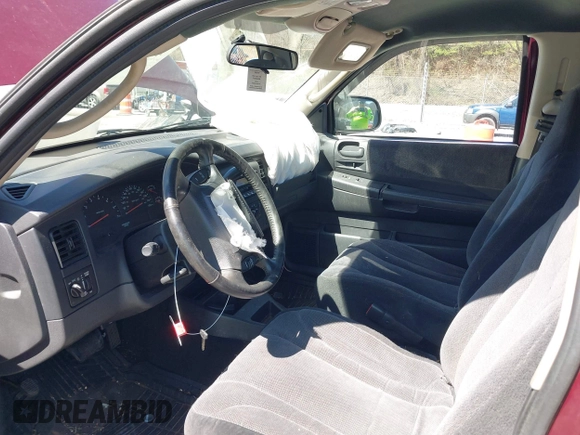 2003 Dodge Dakota SLT with VIN 1D7HG42N33S369870, listed as a IAAI auction lot 41826771 with 214,840 mi miles. Bid and sale history available at carsss.com. Image 5.