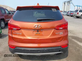 2014 Hyundai Santa Fe z VIN 5XYZTDLB0EG208769, wystawiony jako IAAI lot #42485411 z przebiegiem 82 173 mil mil oraz . Historia ofert i sprzedaży dostępna na DreamBid. Obrazek 16.