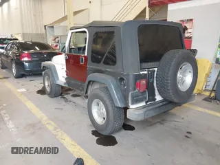 1999 Jeep Wrangler Sport with VIN 1J4FY19S6XP449014, listed as a IAAI auction lot 41893297 with 181,114 mi miles. Bid and sale history available at carsss.com. Image 3.
