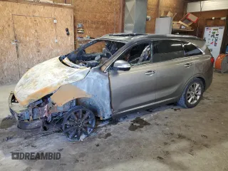 2018 Kia Sorento SX Limited z VIN 5XYPKDA52JG381596, wystawiony jako Copart lot #50960094 z przebiegiem Nie podano mil oraz Szkoda całkowita • Salvage title. Historia ofert i sprzedaży dostępna na DreamBid. Obrazek 1.