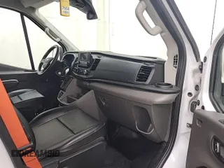 2023 Ford Transit Cargo with VIN 1FTBW3U84PKB20116, listed as a IAAI auction lot 42748031 with 6,591 mi miles and . Bid and sale history available at DreamBid. Image 9.