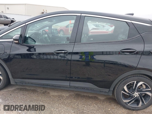2023 Chevrolet Bolt EV 2LT z VIN 1G1FX6S02P4143467, wystawiony jako IAAI lot #41607322 z przebiegiem 95 398 mil mil oraz . Historia ofert i sprzedaży dostępna na DreamBid. Obrazek 14.
