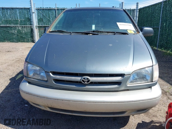 2000 Toyota Sienna LE with VIN 4T3ZF13C6YU173739, listed as a IAAI auction lot 42162320 with 173,659 mi miles. Bid and sale history available at carsss.com. Image 6.