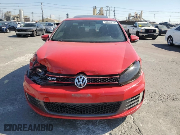 2012 Volkswagen GTI w/Conv & Sunroof z VIN WVWEV7AJ8CW148101, wystawiony jako Copart lot #74610214 z przebiegiem 154 813 mil mil oraz Szkoda całkowita • Salvage title. Historia ofert i sprzedaży dostępna na DreamBid. Obrazek 5.