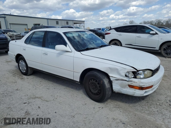 1994 Toyota Camry LE z VIN JT2SK12E0R0256694, wystawiony jako Copart lot #52819245 z przebiegiem 182 566 mil mil oraz Szkoda całkowita • Salvage title. Historia ofert i sprzedaży dostępna na DreamBid. Obrazek 4.