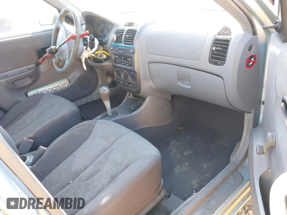 2004 Hyundai Accent GL with VIN KMHCG45C14U547954, listed as a IAAI auction lot 41350219 with 138,436 mi miles. Bid and sale history available at carsss.com. Image 5.