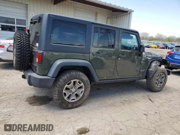 2015 Jeep Wrangler Unlimited Rubicon with VIN 1C4BJWFGXFL752602, listed as a Copart auction lot 54102395 with 26,466 mi miles and Salvage title. Bid and sale history available at DreamBid. Image 3.