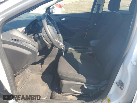 2017 Ford Focus SE with VIN 1FADP3F26HL313478, listed as a Copart auction lot 57078015 with 56,807 mi miles and Salvage title. Bid and sale history available at DreamBid. Image 7.