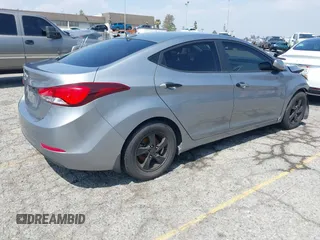 2014 Hyundai Elantra SE z VIN KMHDH4AE5EU118200, wystawiony jako IAAI lot #42178781 z przebiegiem 90 933 mil mil oraz . Historia ofert i sprzedaży dostępna na DreamBid. Obrazek 4.