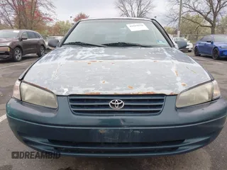 1997 Toyota Camry LE z VIN 4T1BG22K5VU024448, wystawiony jako IAAI lot #42019670 z przebiegiem 133 385 mil mil oraz . Historia ofert i sprzedaży dostępna na DreamBid. Obrazek 6.