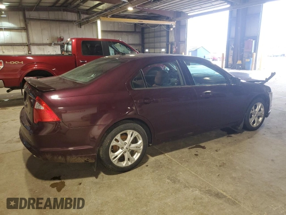 2012 Ford Fusion SE with VIN 3FAHP0HA0CR377773, listed as a Copart auction lot 57278885 with 133,700 mi miles and Salvage title. Bid and sale history available at DreamBid. Image 3.