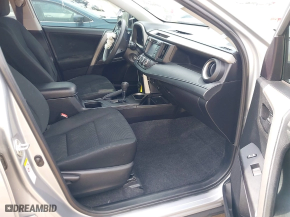 2018 Toyota RAV4 LE with VIN 2T3ZFREV2JW464807, listed as a IAAI auction lot 40966277 with 113,053 mi miles. Bid and sale history available at carsss.com. Image 5.