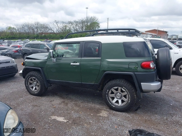 2014 Toyota FJ Cruiser with VIN JTEBU4BF1EK203587, listed as a IAAI auction lot 41978010 with 62,438 mi miles. Bid and sale history available at carsss.com. Image 14.