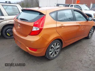 2015 Hyundai Accent Sport with VIN KMHCU5AE3FU205849, listed as a IAAI auction lot 41827093 with 112,980 mi miles. Bid and sale history available at carsss.com. Image 4.