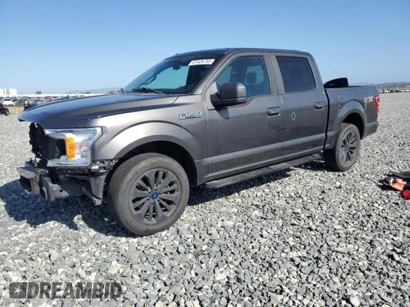 2018 Ford F-150 XL with VIN 1FTEW1CPXJKC26636, listed as a Copart auction lot 61426755 with 47,137 mi miles and Salvage title. Bid and sale history available at DreamBid. Image 1.