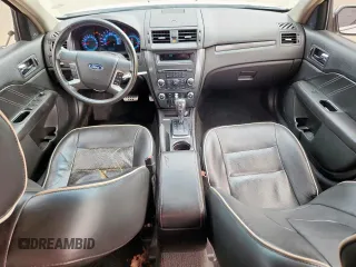 2012 Ford Fusion SEL with VIN 3FAHP0JG0CR395673, listed as a Copart auction lot 57904135 with 169,886 mi miles and Salvage title. Bid and sale history available at DreamBid. Image 8.