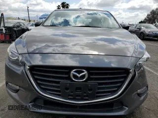 2018 Mazda 3 Touring z VIN 3MZBN1L38JM219466, wystawiony jako Copart lot #56766025 z przebiegiem 124 775 mil mil oraz Szkoda całkowita • Salvage title. Historia ofert i sprzedaży dostępna na DreamBid. Obrazek 5.