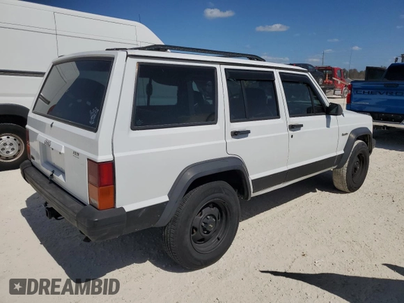 1994 Jeep Cherokee SE with VIN 1J4FT28SXRL151422, listed as a Copart auction lot 77358594 with 74,628 mi miles and Salvage Title. Bid and sale history available at carsss.com. Image 3.