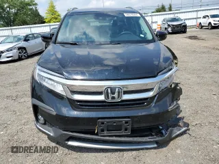 2020 Honda Pilot Touring 8-Passenger with VIN 5FNYF5H95LB021658, listed as a Copart auction lot 58878594 with 36,122 mi miles and Salvage Title. Bid and sale history available at DreamBid. Image 5.