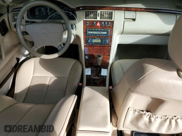 1999 Mercedes-Benz E-Class with VIN WDBJF82H9XX022535, listed as a Copart auction lot 86554534 with 140,904 mi miles and Salvage Title. Bid and sale history available at carsss.com. Image 8.