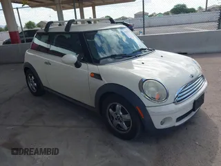 2010 MINI Hardtop with VIN WMWMF3C53ATZ25765, listed as a IAAI auction lot 42805681 with 108,796 mi miles and . Bid and sale history available at DreamBid. Image 1.