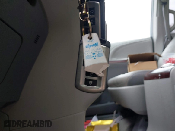 2012 Toyota Sienna XLE with VIN 5TDDK3DC7CS037579, listed as a IAAI auction lot 41080620 with 158,843 mi miles. Bid and sale history available at carsss.com. Image 11.
