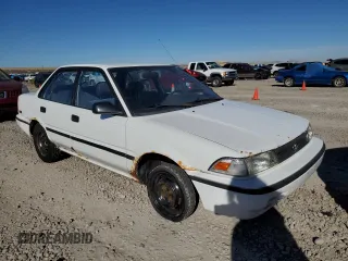 1992 Toyota Corolla z VIN JT2AE94A1N0300157, wystawiony jako Copart lot #77783474 z przebiegiem 180 103 mil mil oraz Czysty tytuł • Clean title. Historia ofert i sprzedaży dostępna na DreamBid. Obrazek 4.