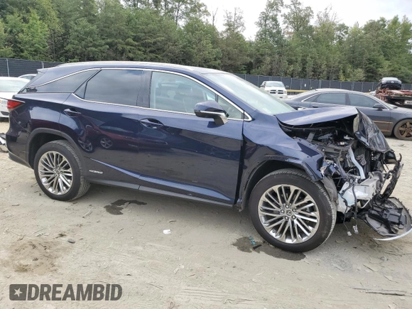 2022 Lexus RX with VIN JTJJGKFA7N2029399, listed as a Copart auction lot 70560884 with 13,672 mi miles and Salvage Title. Bid and sale history available at carsss.com. Image 4.