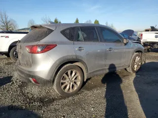2013 Mazda CX-5 Grand Touring with VIN JM3KE4DEXD0155143, listed as a Copart auction lot 86852874 with 187,914 mi miles and Salvage Title. Bid and sale history available at carsss.com. Image 3.