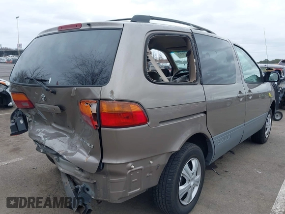 1999 Toyota Sienna LE with VIN 4T3ZF13C5XU121145, listed as a IAAI auction lot 41721171 with 229,760 mi miles and . Bid and sale history available at DreamBid. Image 4.
