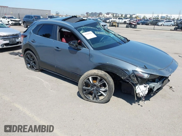 2024 Mazda CX-30 S Preferred z VIN 3MVDMBCMXRM640631, wystawiony jako IAAI lot #41900958 z przebiegiem 10 332 mil mil oraz . Historia ofert i sprzedaży dostępna na DreamBid. Obrazek 1.