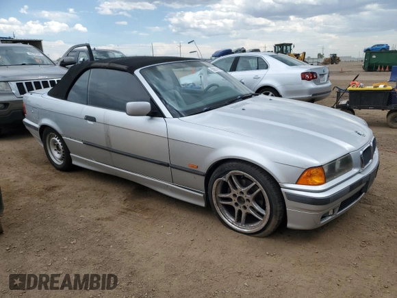 1998 BMW 3 Series 323i with VIN WBABJ8332WEM22760, listed as a Copart auction lot 59631805 with 77,300 mi miles and Salvage title. Bid and sale history available at DreamBid. Image 4.