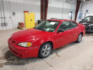 2003 Pontiac Grand Am GT with VIN 1G2NW12E23C319717, listed as a IAAI auction lot 41540987 with 195,850 mi miles. Bid and sale history available at carsss.com. Image 2.