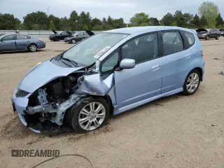 2010 Honda Fit Sport with VIN JHMGE8H68AC032636, listed as a Copart auction lot 54779935 with 107,623 mi miles and Salvage title. Bid and sale history available at DreamBid. Image 1.