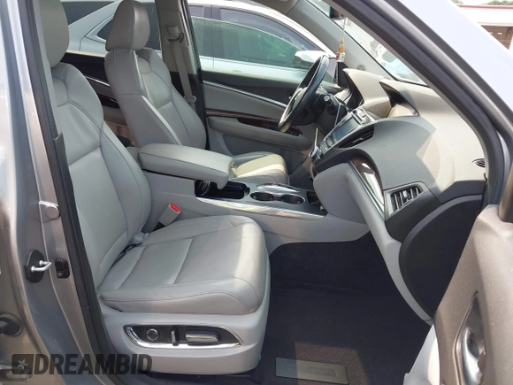 2020 Acura MDX with VIN 5J8YD3H39LL016466, listed as a IAAI auction lot 42376611 with 74,873 mi miles and . Bid and sale history available at DreamBid. Image 5.