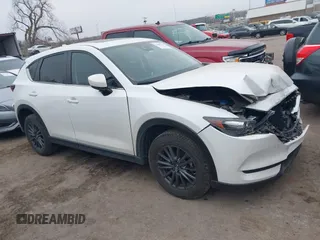 2021 Mazda CX-5 Touring with VIN JM3KFACM0M0412718, listed as a IAAI auction lot 41486753 with 41,496 mi miles. Bid and sale history available at carsss.com. Image 13.