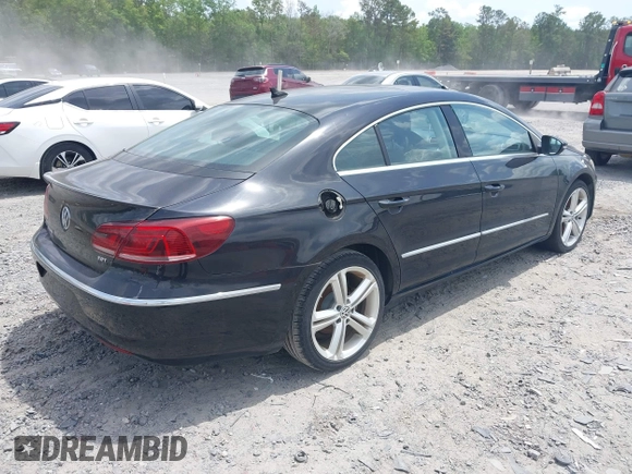 2013 Volkswagen CC Lux with VIN WVWRP7AN2DE525995, listed as a IAAI auction lot 42105042 with 148,818 mi miles. Bid and sale history available at carsss.com. Image 4.